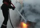 Au incendiat mașina unui asociat și au fost reținuți de polițiști